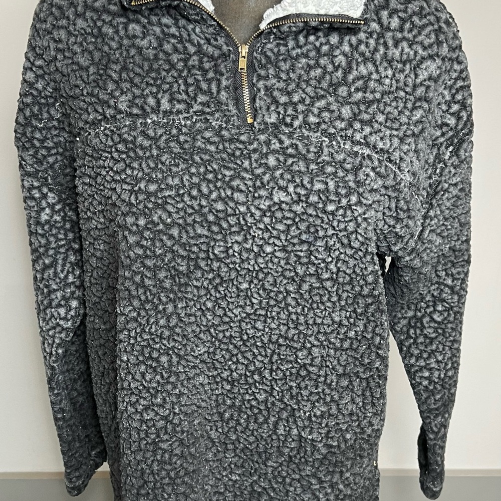 Womens Sherpa size small, impressions, black and white collar, zipper in front.